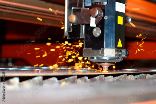 Industrial laser with sparks flying around