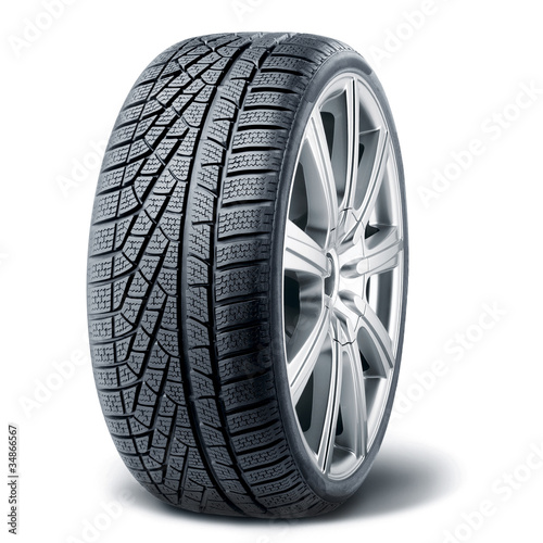 Winter tire with alurim on white background photo