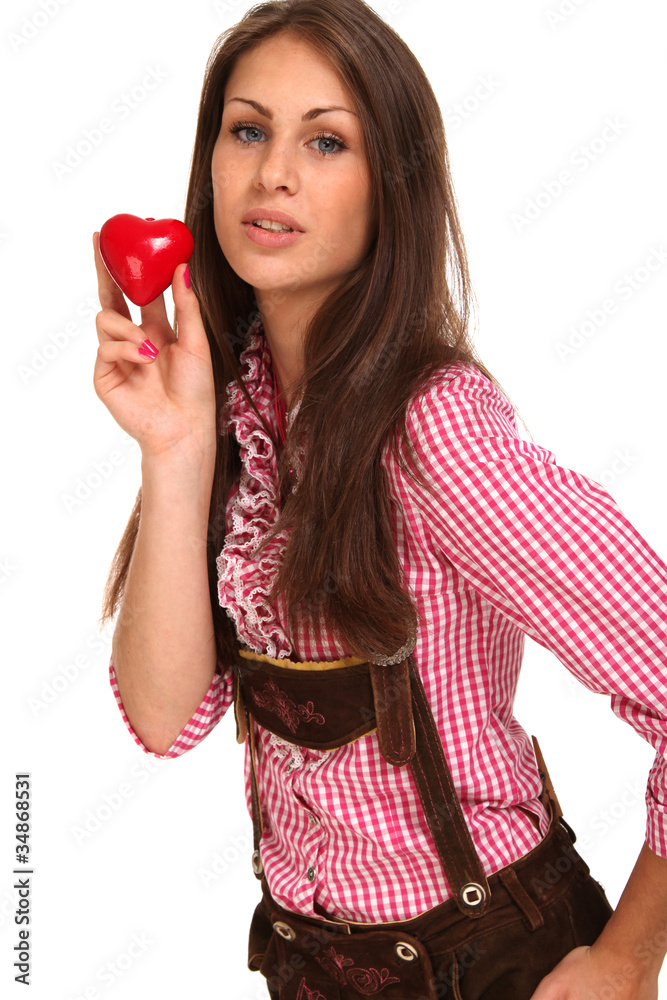 Frau in Lederhosen mit Herz Frau in Lederhosen mit Herz