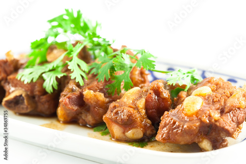 Pork ribs with sweet sauce on white background