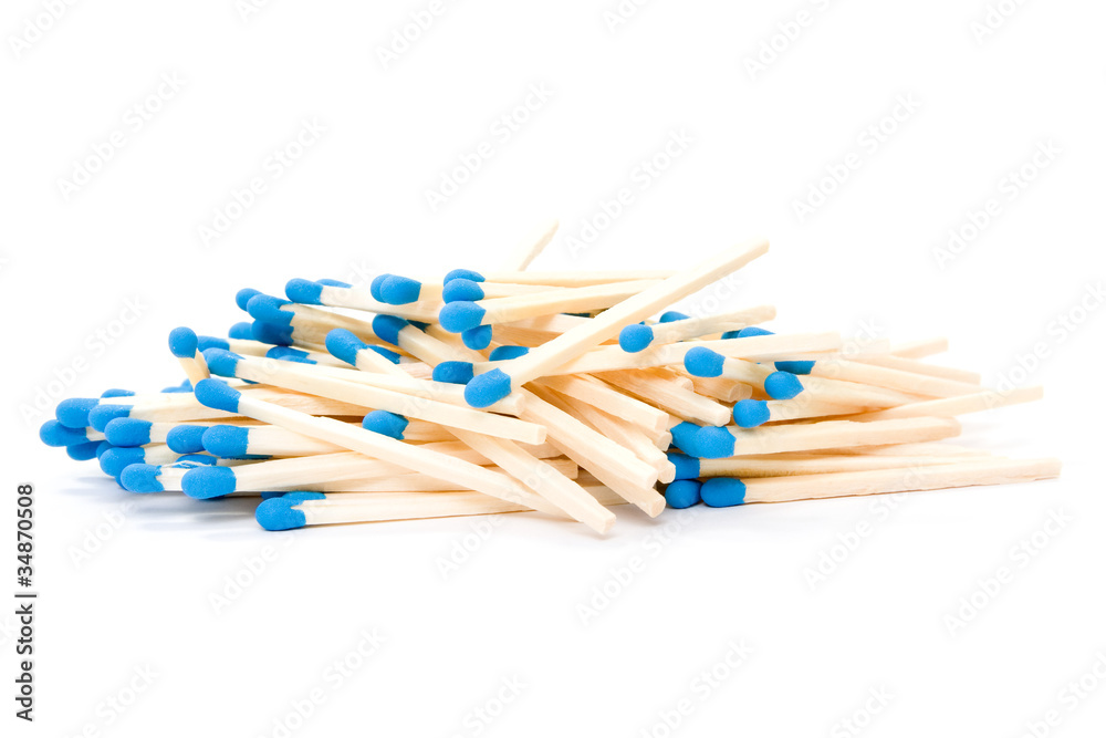 Pile of matches over a white background.