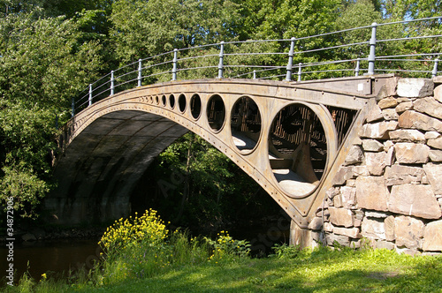 Small metal bridge over a river