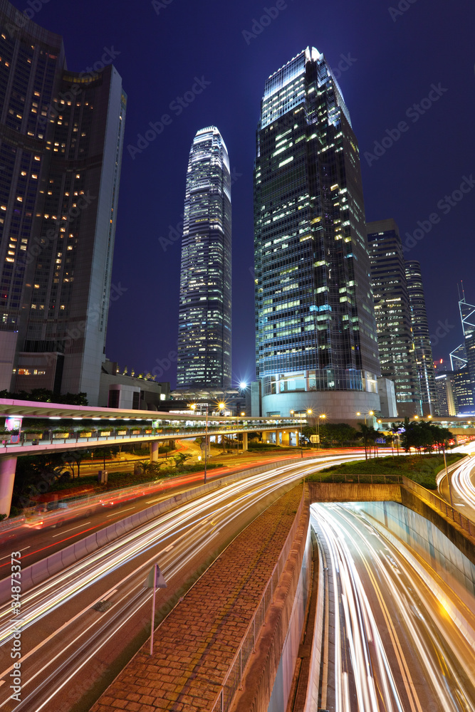Hong Kong business district at night in rush hour Hong Kong business district at night in rush hour