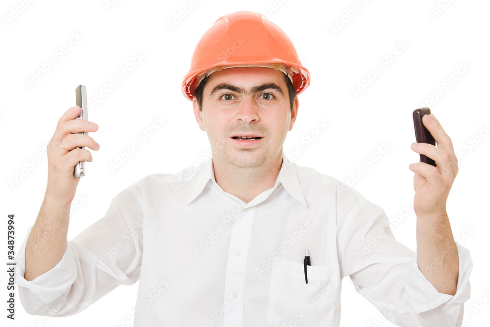 Crazy businessman in his helmet on the phone. Crazy businessman in his helmet on the phone.