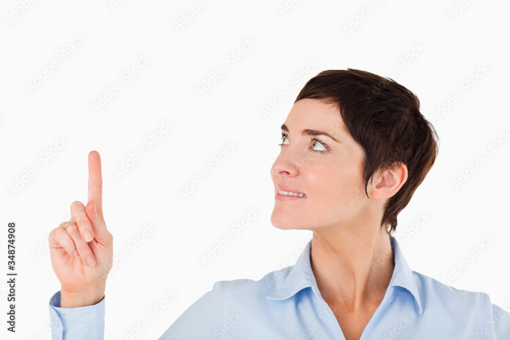 Close up of a businesswoman pointing at copy space Close up of a businesswoman pointing at copy space