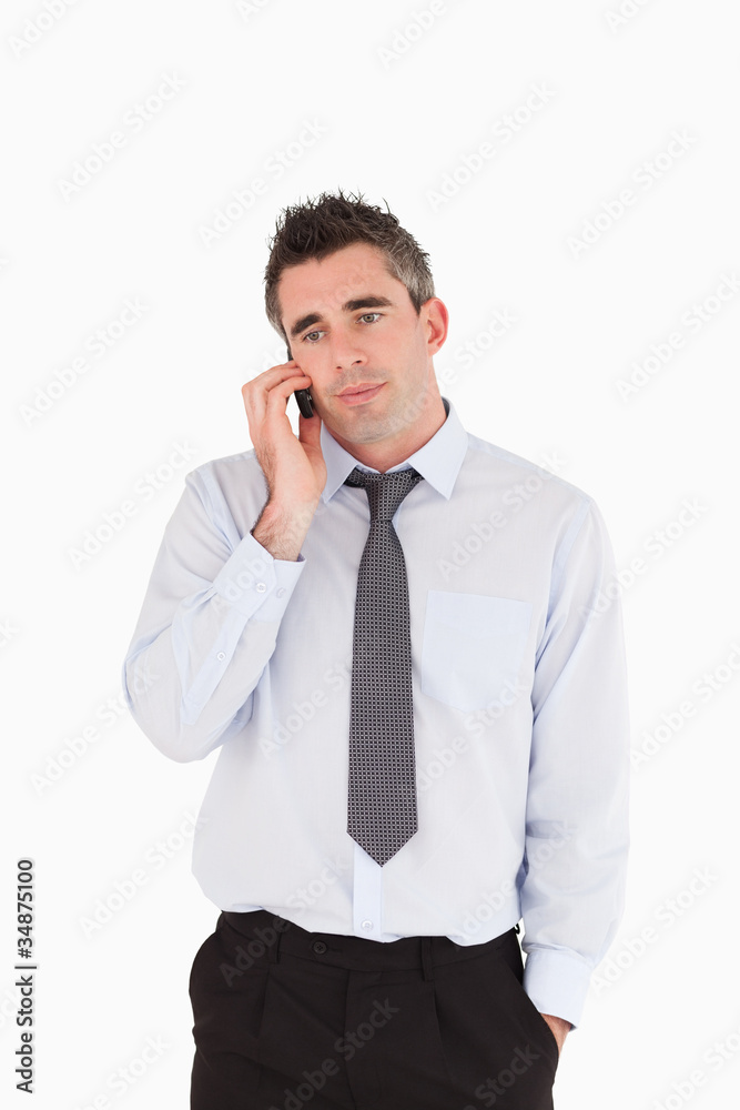Portrait of a businessman making a phone call Portrait of a businessman making a phone call