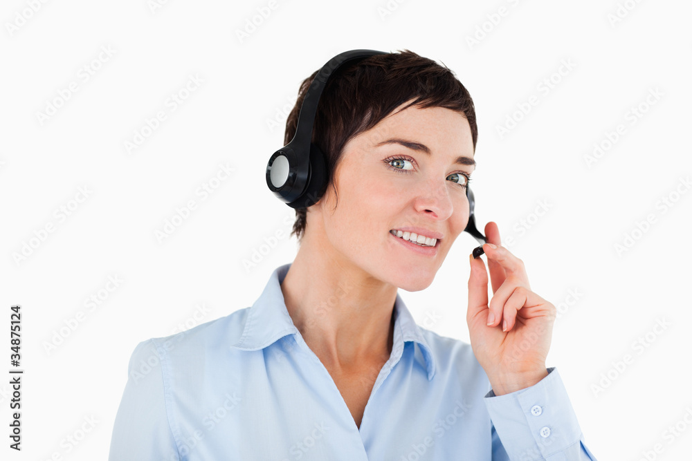 Close up of a female worker using a headset Close up of a female worker using a headset
