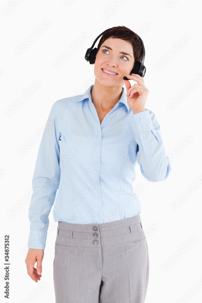 Portrait of a smiling office worker with a headset Portrait of a smiling office worker with a headset