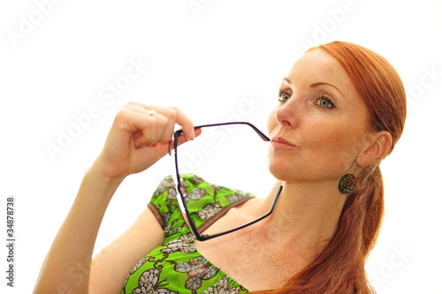 young ginger woman with glasess