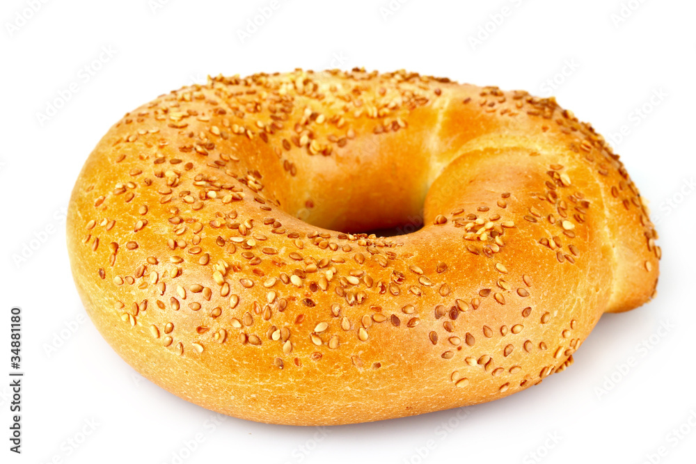 Tasty bagel with sesame seeds isolated on white Tasty bagel with sesame seeds isolated on white
