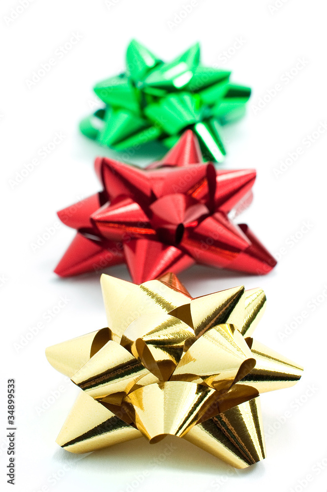 red, gold and green gift ribbons isolated on white red, gold and green gift ribbons isolated on white
