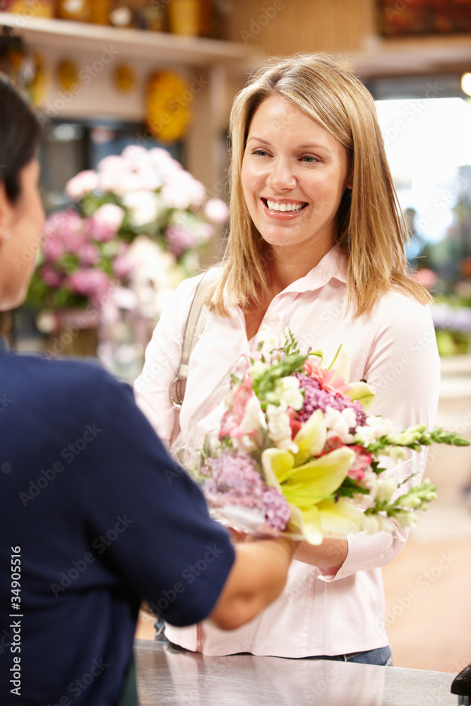 Woman shopping in florist