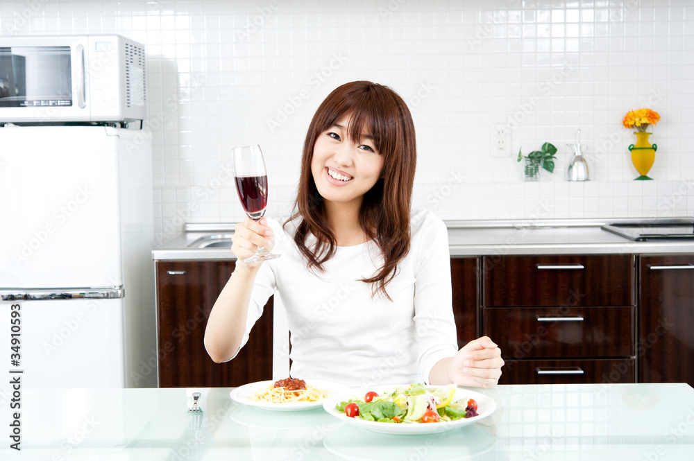 attractive asian woman in the kitchen