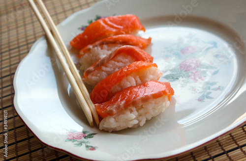 Sushi with salmon in a plate