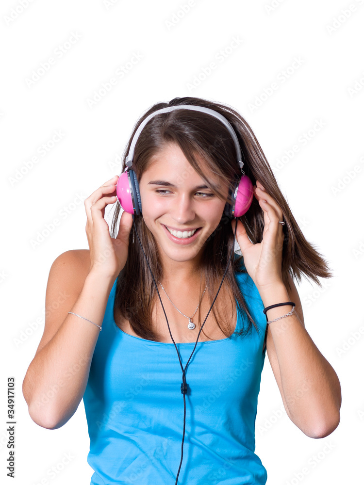 Cute young woman with headphones dancing on music Cute young woman with headphones dancing on music