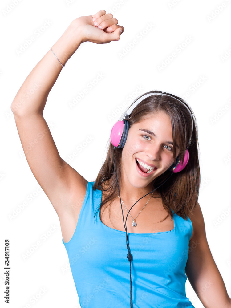 Cute young woman with headphones dancing on music Cute young woman with headphones dancing on music