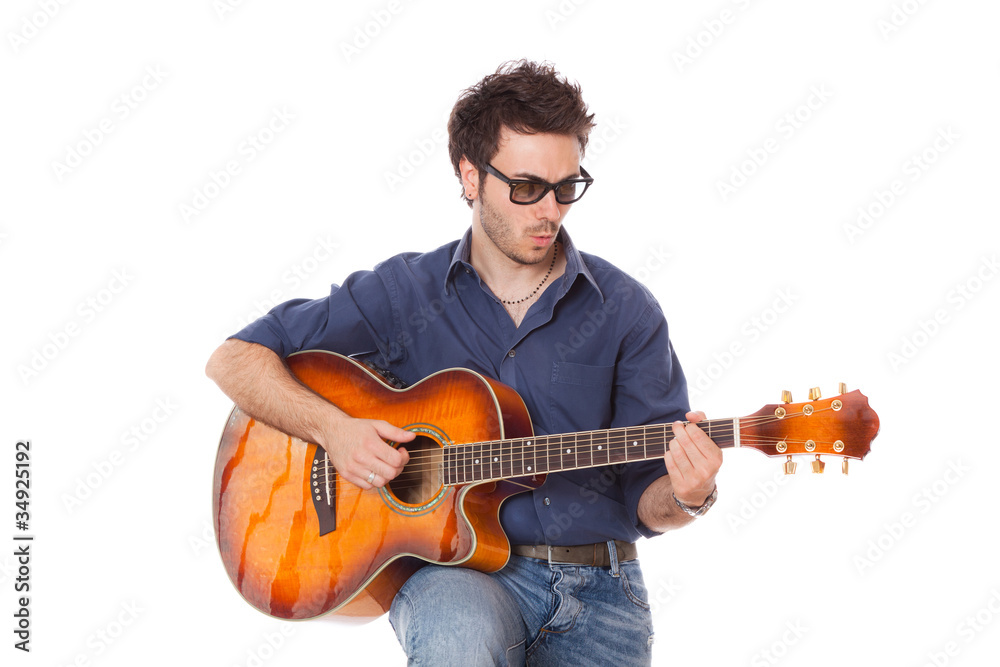Obraz premium Young Man Playing Guitar