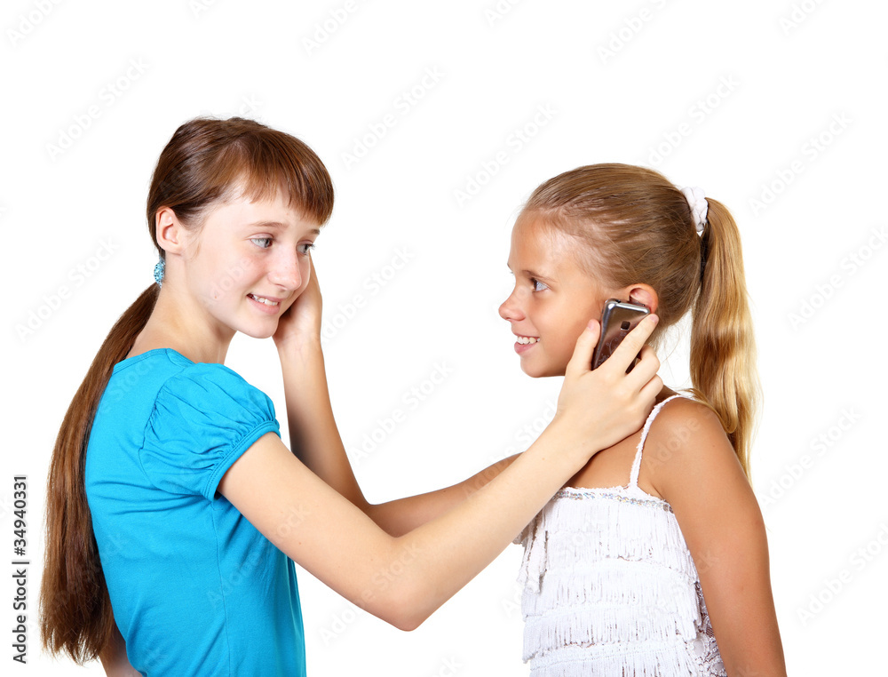 Pretty teenage girls with mobile phone Pretty teenage girls with mobile phone
