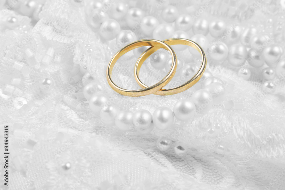 wedding rings over silver backgound wedding rings over silver backgound