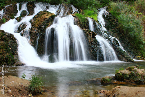 Fototapeta Naklejka Na Ścianę i Meble -  river with waterfall in the forest