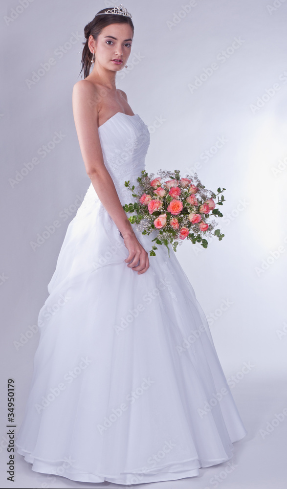 Woman in wedding dress with flowers' bouquet. Woman in wedding dress with flowers' bouquet.
