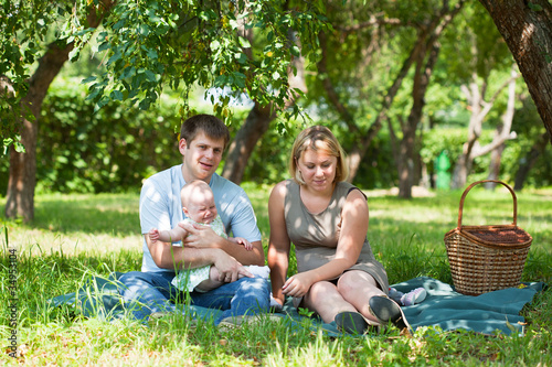 Family having picnic in park © Shchipkova Elena
