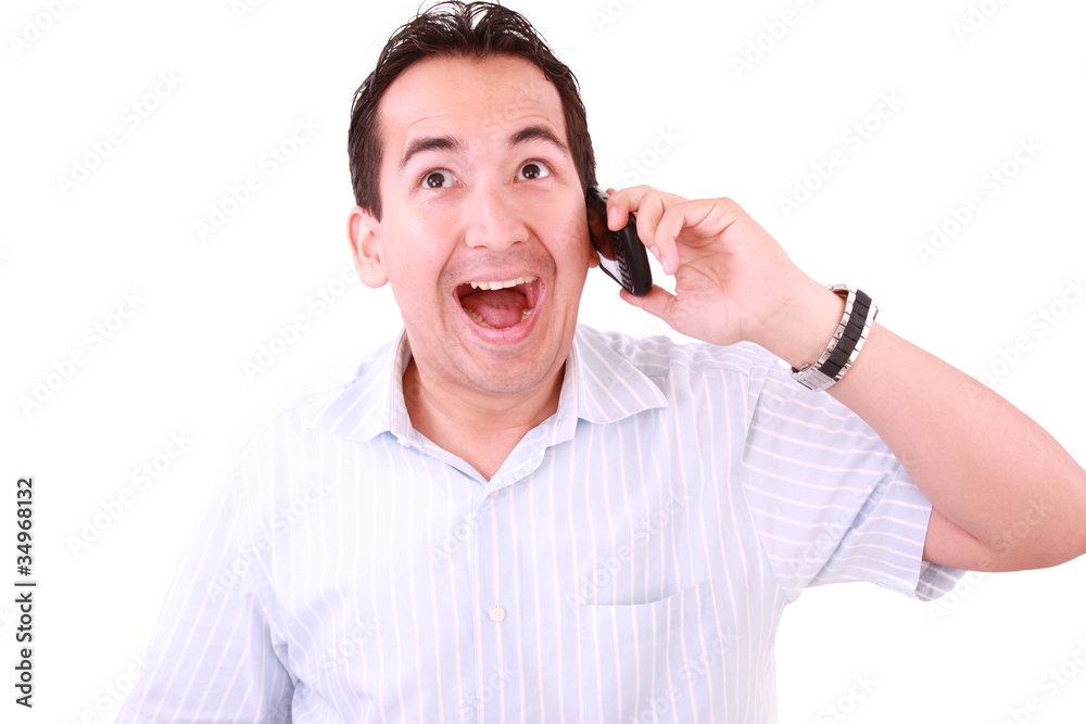 Beautiful young man laughs and talks by mobile phone. Beautiful young man laughs and talks by mobile phone.