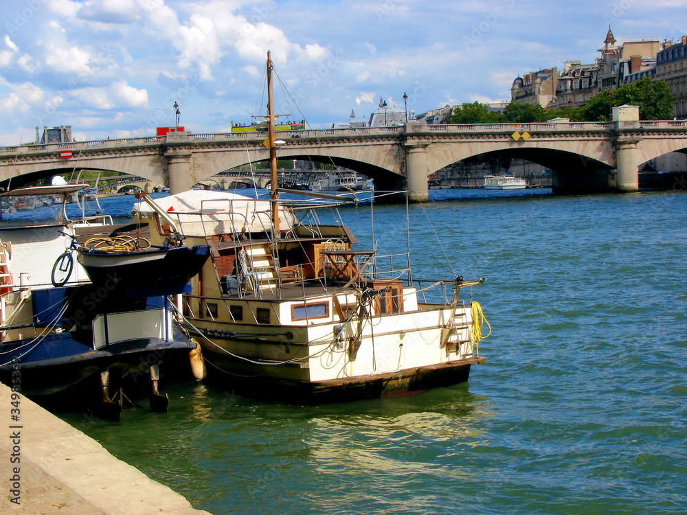 Fototapeta premium river Seine, bridge and yachts in Paris, France