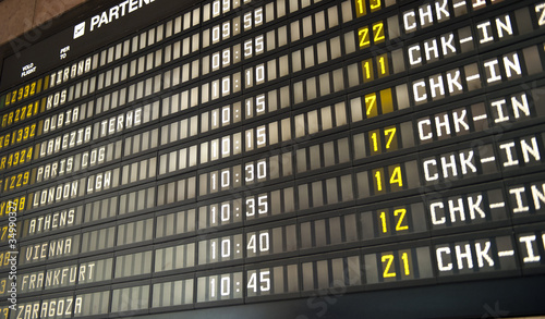 Flight information board in airport terminal