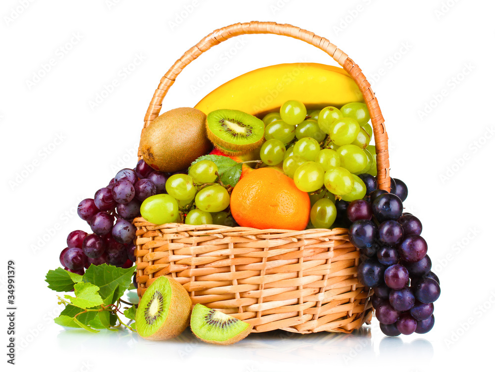Ripe juicy fruits in basket isolated on white Ripe juicy fruits in basket isolated on white