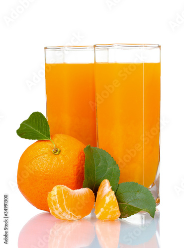 Glass of fresh tangerine juice isolated on white
