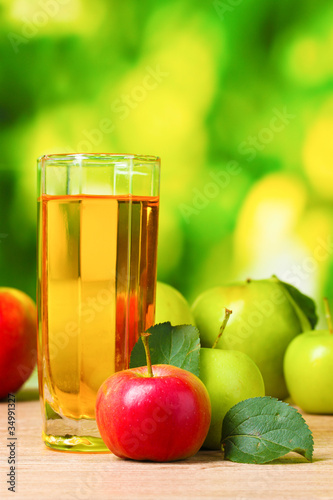 Healthy organic apple juice on table