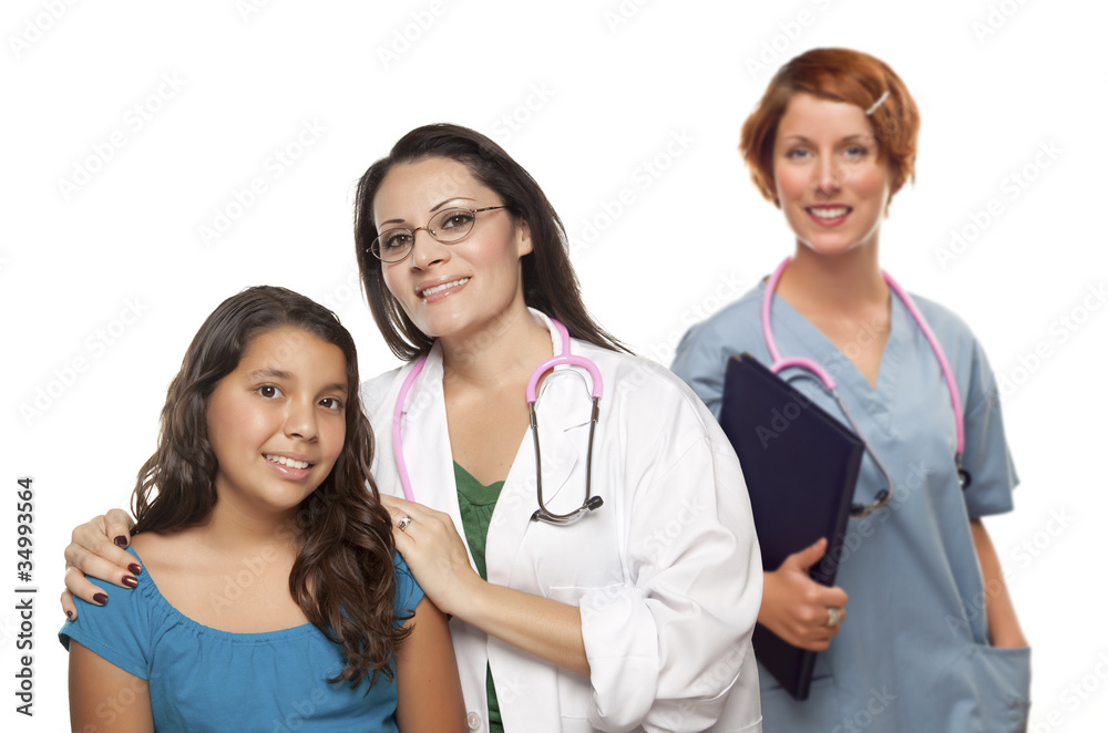 Hispanic Female Doctor with Child Patient and Colleague Behind Hispanic Female Doctor with Child Patient and Colleague Behind