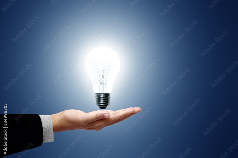 Light bulb in hand Light bulb in hand