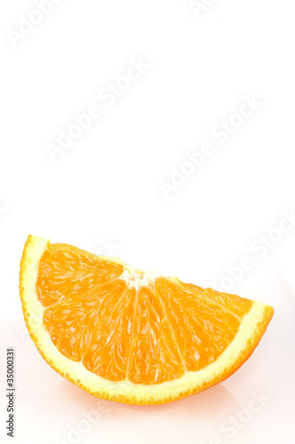 A quarter orange isolated on a white background