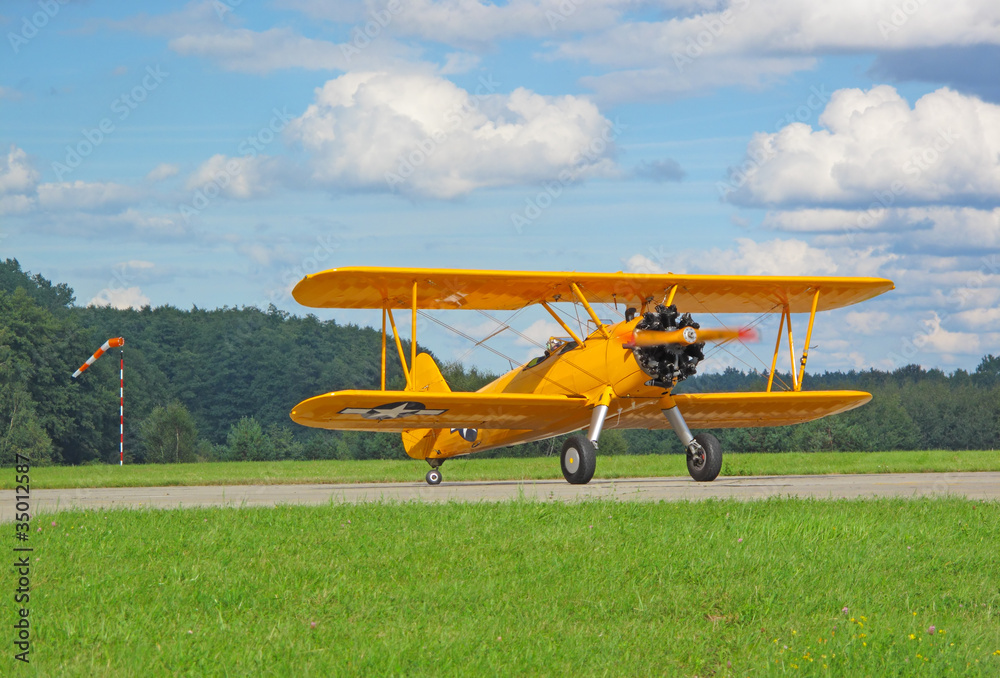 Old classic biplane on airport Old classic biplane on airport