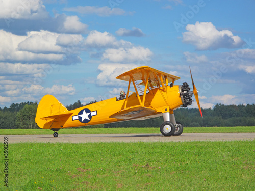 Old classic biplane ready to take off