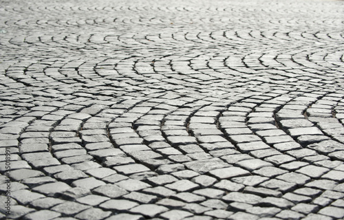 Grey tiles on the pavement