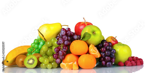 Ripe juicy fruits isolated on white