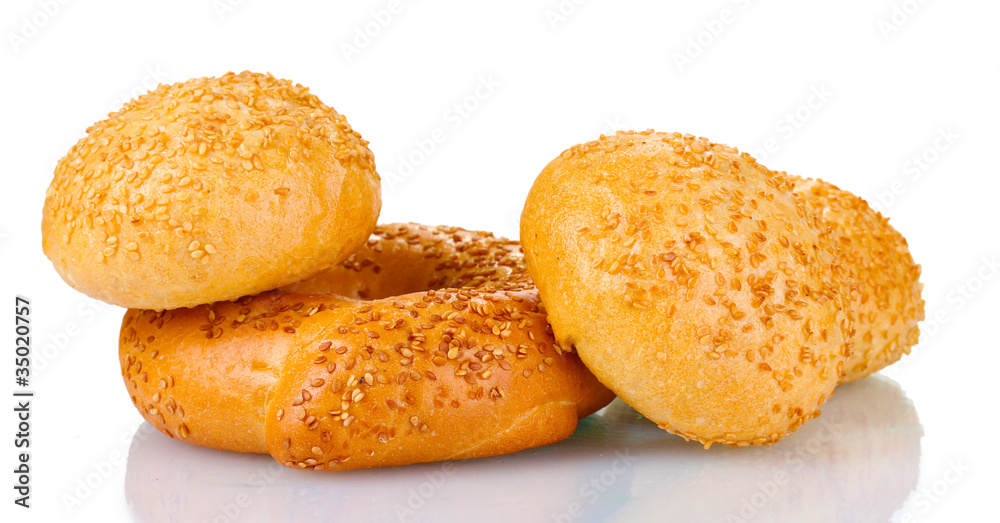buns with sesame seeds and bagel isolated on white