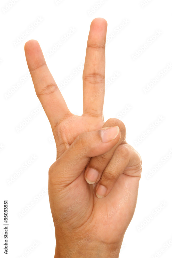 Hand showing the sign of victory and peace Hand showing the sign of victory and peace