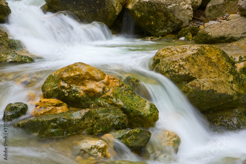 wet stones in stream