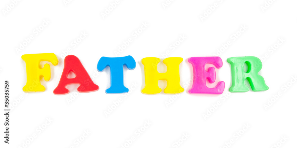 father written in child's fridge magnets on white father written in child's fridge magnets on white
