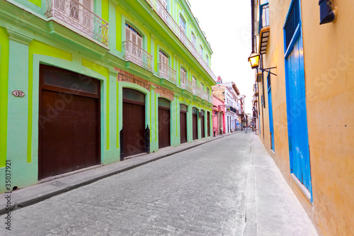 Street in Old Havana sidelined by colorful buildings