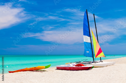 Photography Sailing boats and water bikes in the cuban beach of Varadero
