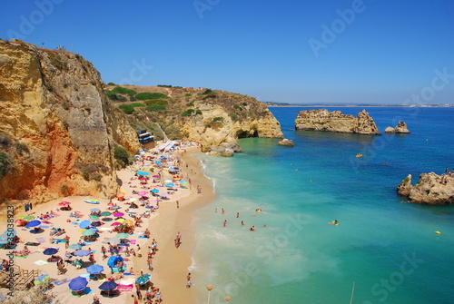 Dona Ana beach, Algarve coast in Portugal photo