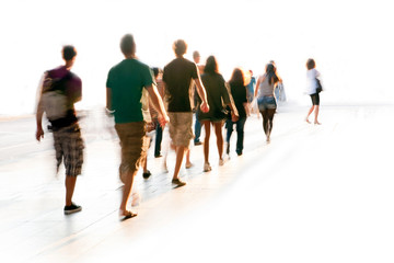 Blurred people walking