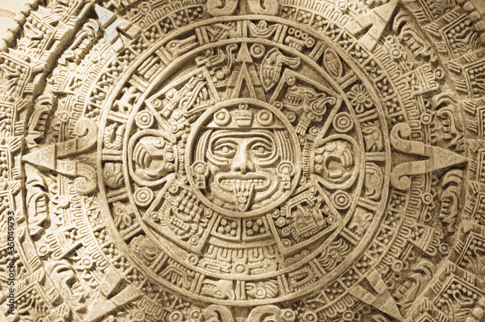 Close up of Aztec calendar stone carving Close up of Aztec calendar stone carving