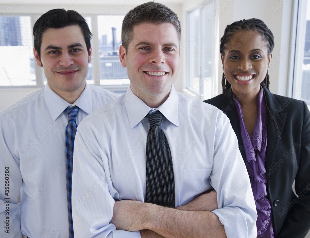 Smiling business people standing together Smiling business people standing together