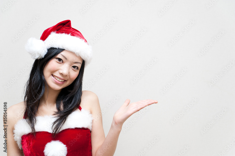 a portrait of attractive asian santa claus a portrait of attractive asian santa claus